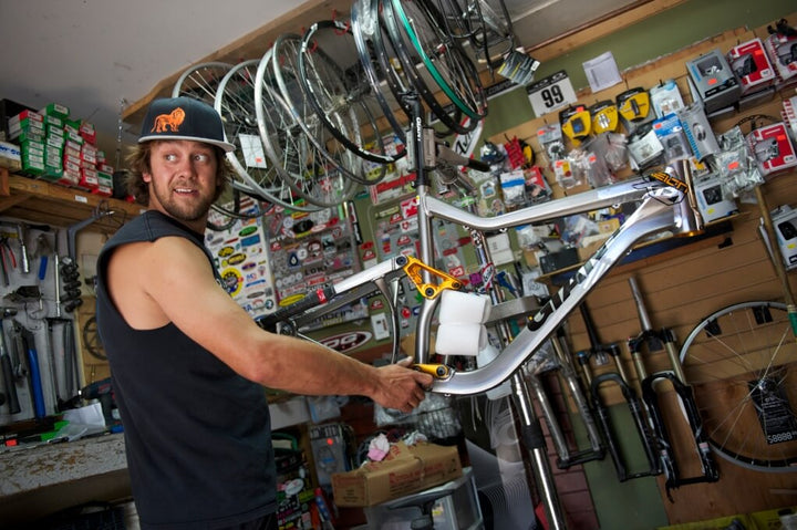 Bike Mechanic servicing Giant Bicycle MTB